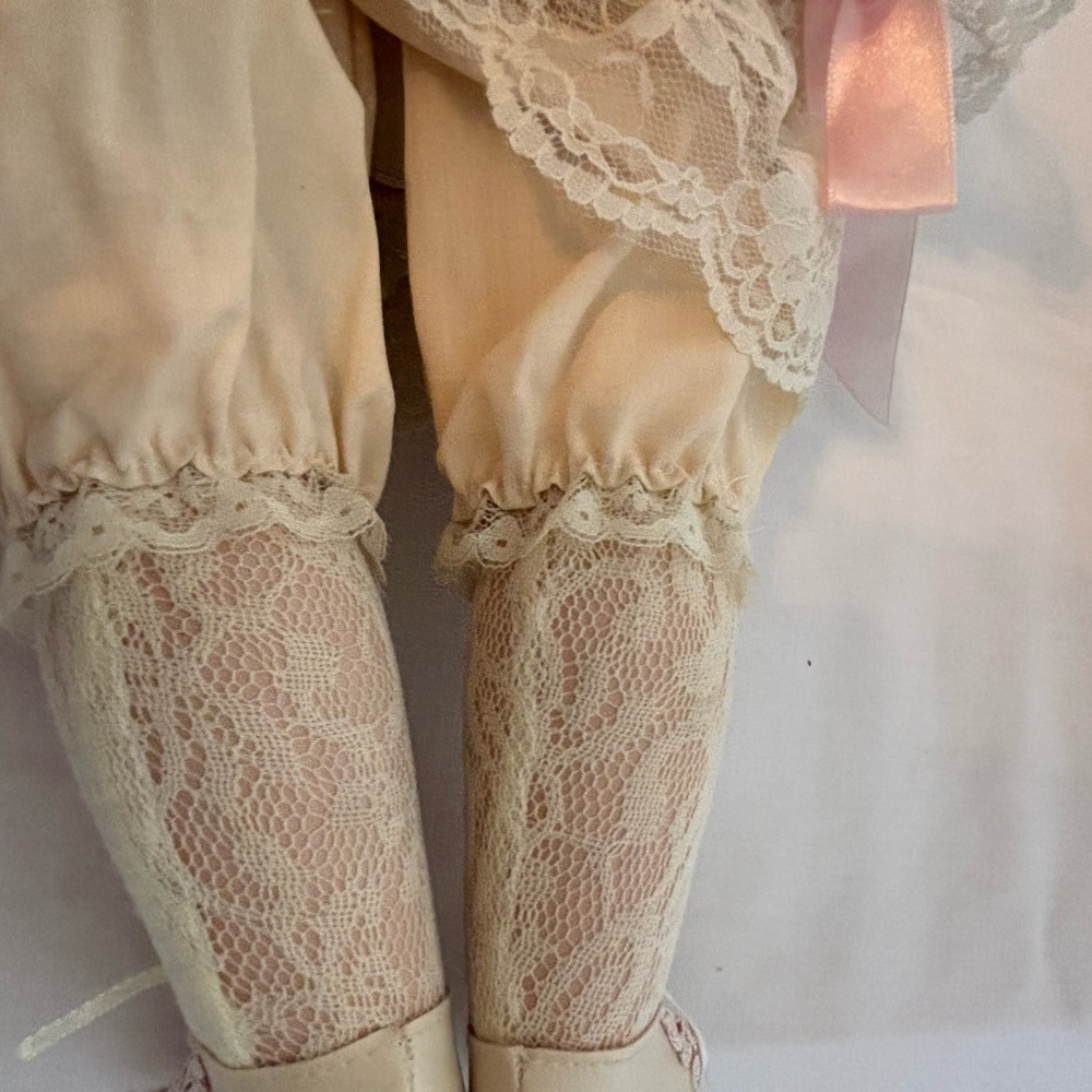 Elegant Pink and Cream Porcelain Doll - Picture 10 of 11